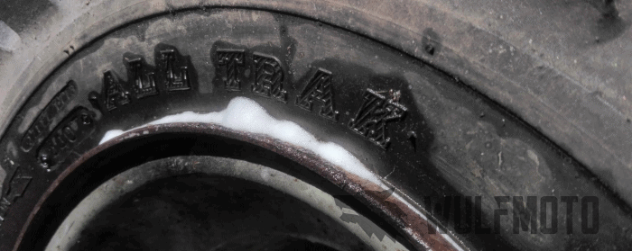 Bubbles indicating an air leak on an atv tire